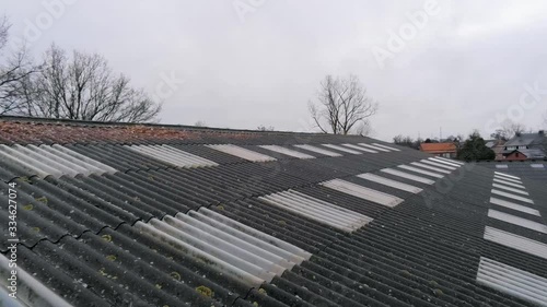 Wallpaper Mural Dynamic droneshot above the old roof of a horse-riding center. Torontodigital.ca
