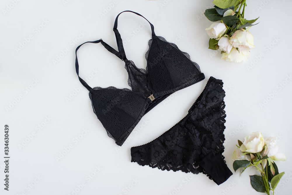 Black woman bra with bouquet of roses on white background. Stock Photo |  Adobe Stock
