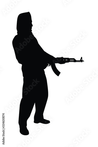 Terrorist with gun silhouette