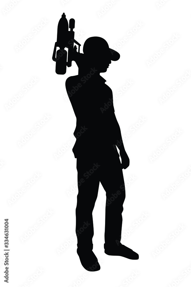 Young man with water gun silhouette, Thailand Songkran day