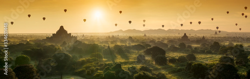 Scenic sunrise with many hot air balloons above Bagan in Myanmar. Bagan is an ancient city with thousands of historic buddhist temples and stupas.Bagan, Myanmar (Burma)