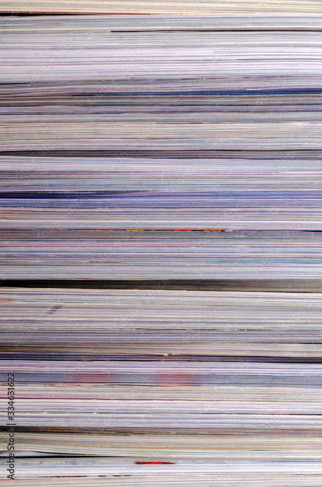 Closeup background of a pile of magazines. Closeup background of a pile of magazines.