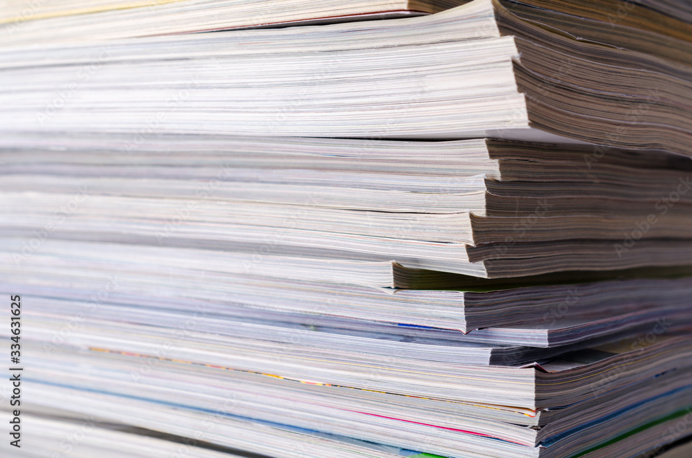 Closeup background of a pile of magazines. Closeup background of a pile of magazines.