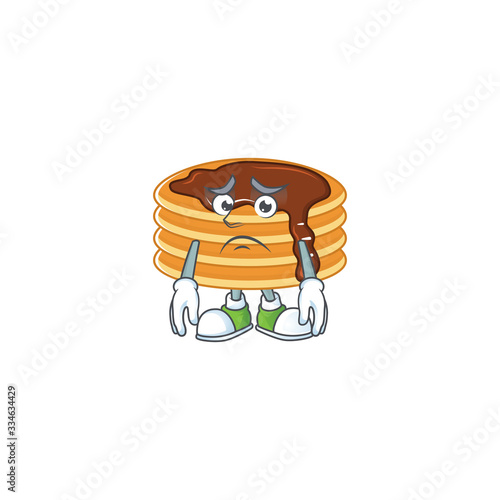 Cartoon picture of chocolate cream pancake with worried face