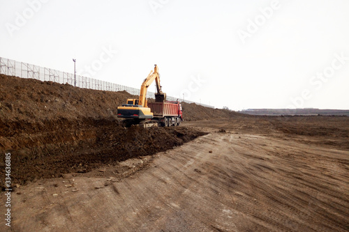 Wallpaper Mural excavator on construction site Torontodigital.ca