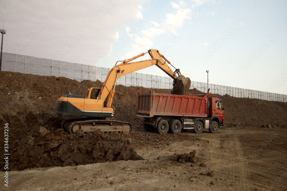 excavator on construction site excavator on construction site
