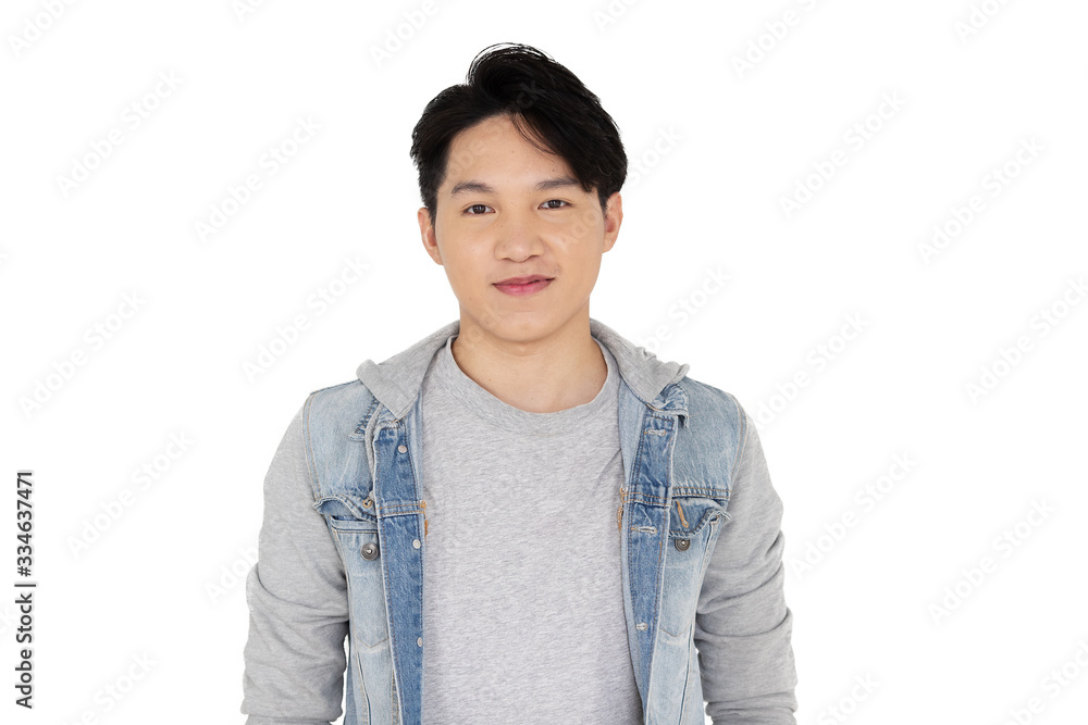 Young Asian man in jean dress isolated white background Young Asian man in jean dress isolated white background