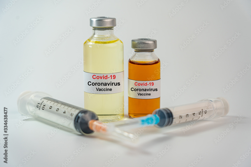 COVID-19 Coronavirus vaccine bottle on white background COVID-19 Coronavirus vaccine bottle on white background
