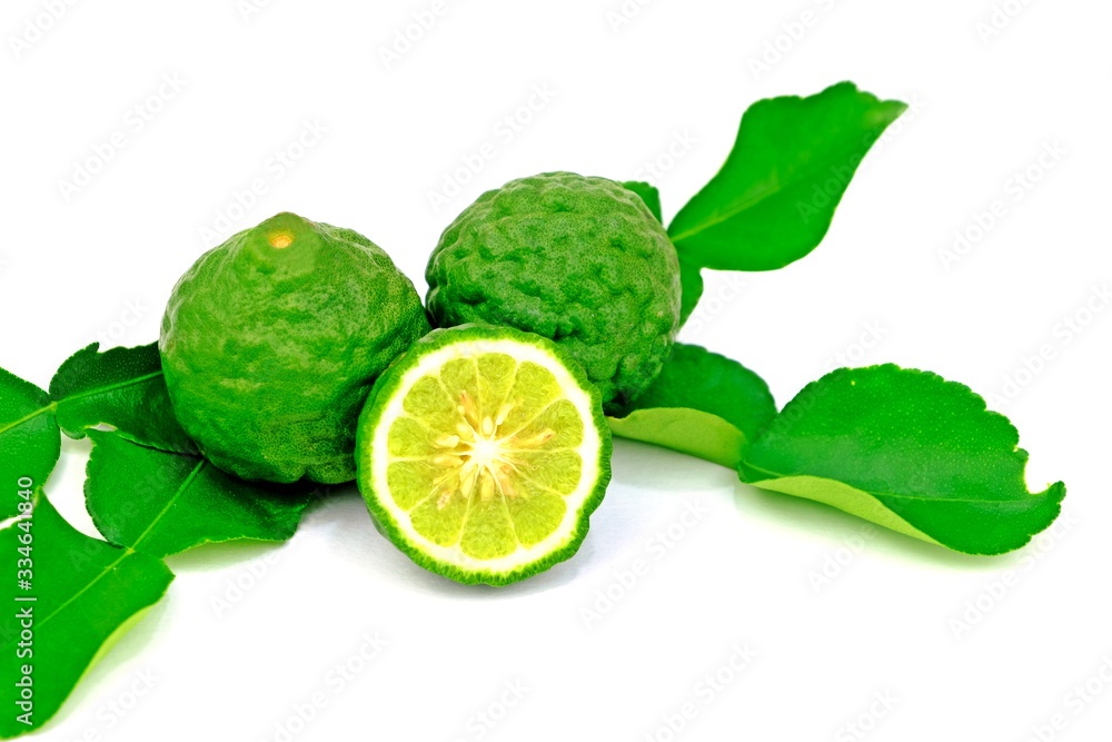 Organic bergamots full and cut with its leaves isolate on white background. Organic bergamots full and cut with its leaves isolate on white background.