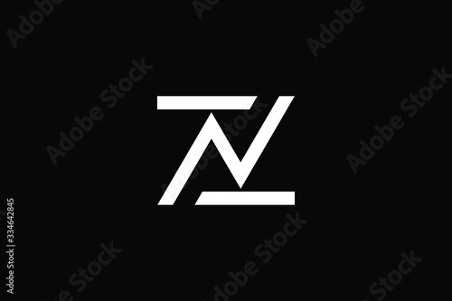 Minimal elegant monogram art logo. Outstanding professional trendy awesome artistic ZN NZ initial based Alphabet icon logo. Premium Business logo White color on black background