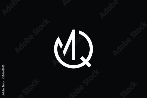 Minimal elegant monogram art logo. Outstanding professional trendy awesome artistic MQ QM initial based Alphabet icon logo. Premium Business logo White color on black background photo