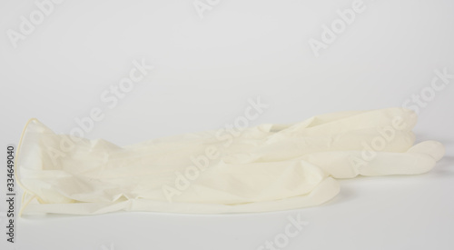 Sterilized surgical latex doctor gloves on white background
