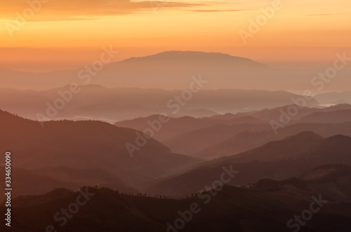 Fototapeta Naklejka Na Ścianę i Meble -  Layer of mountains and mist during sunset