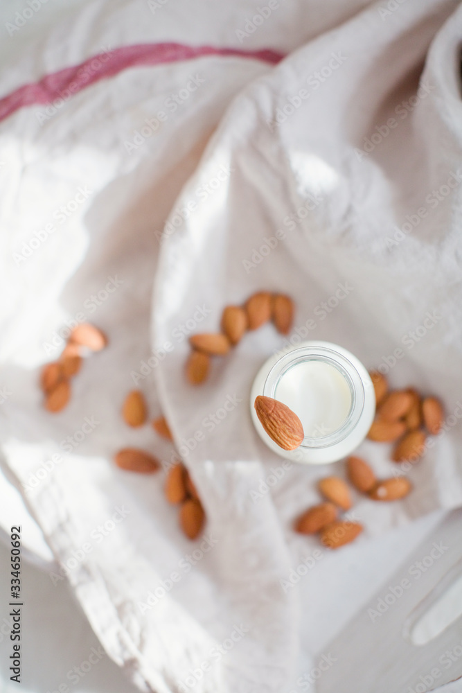 Homemade almond milk in a small bottle Homemade almond milk in a small bottle