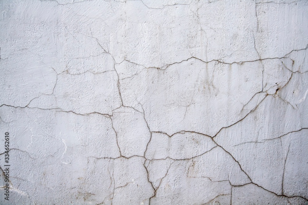 Obraz premium Cracked stucco on the wall