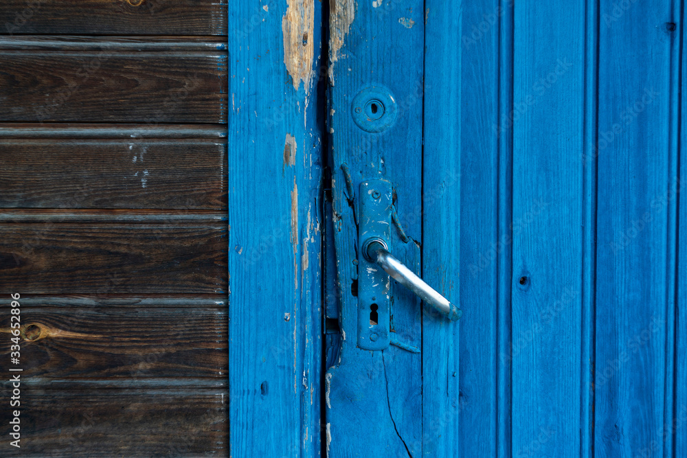 texture of a wooden door painted with blue paint texture of a wooden door painted with blue paint