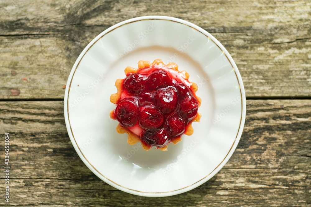 cherry pie on a white saucer. high-calorie sweet food cherry pie on a white saucer. high-calorie sweet food