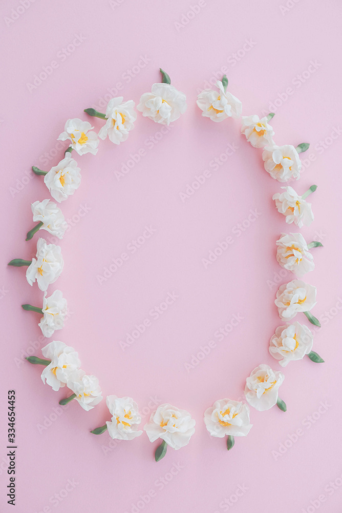 Frame made of beautiful fresh white daffodil flowers.