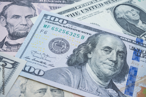 Wallpaper Mural US president on many US dollars bill banknote background. Concept of economy financial crisis in global world and USA. Central banking system of USA (FED) consider and control suitable interest rate. Torontodigital.ca