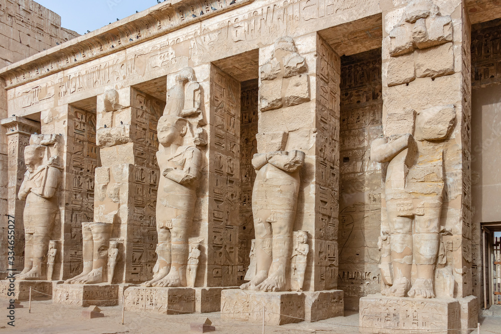 Ramessid statues and columns in the first courtyard of the Mortuary Temple of Ramesses III