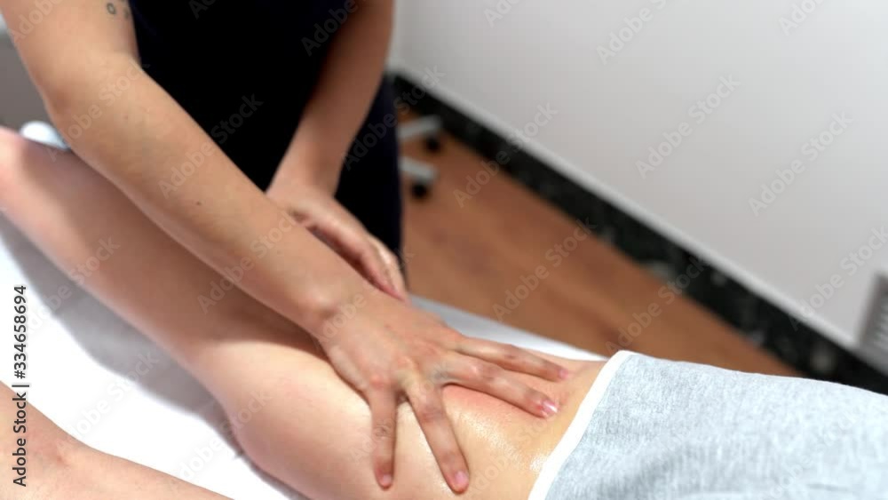 custom made wallpaper toronto digitalMedical massage at the leg in a physiotherapy center.