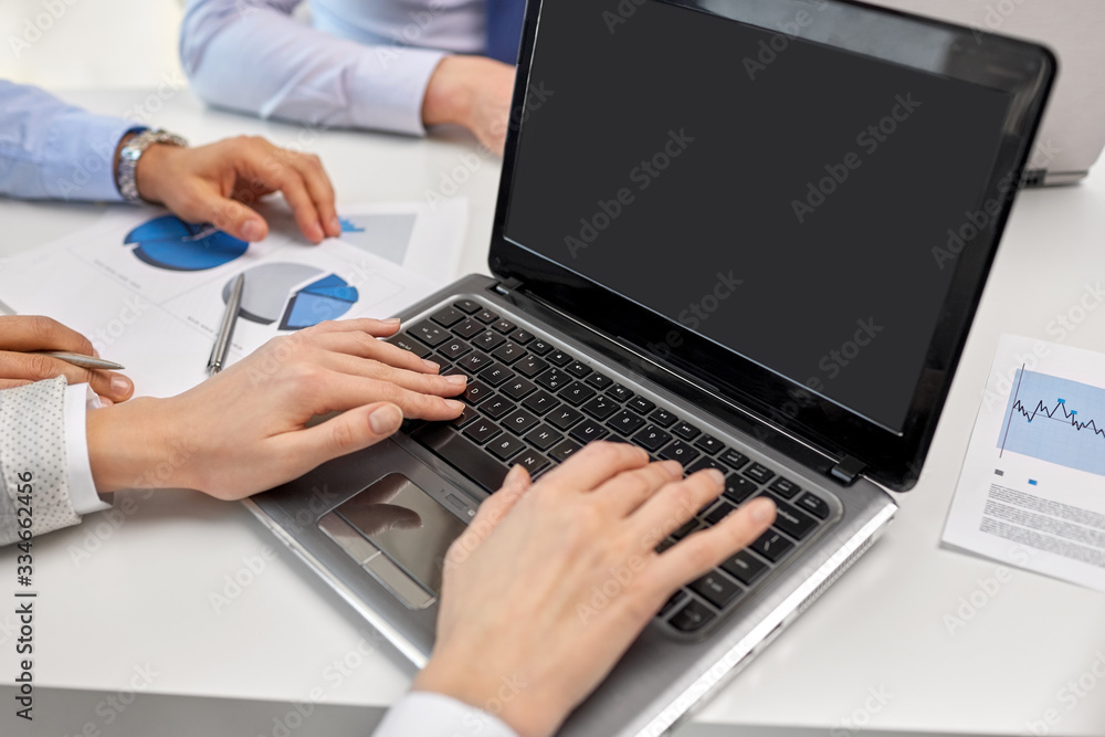 business, people and technology concept - close up of businesspeople with laptop at office business, people and technology concept - close up of businesspeople with laptop at office