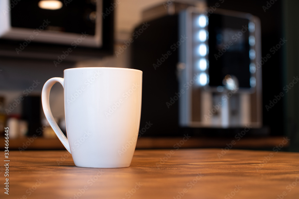 Fototapeta premium White mug on kitchen background