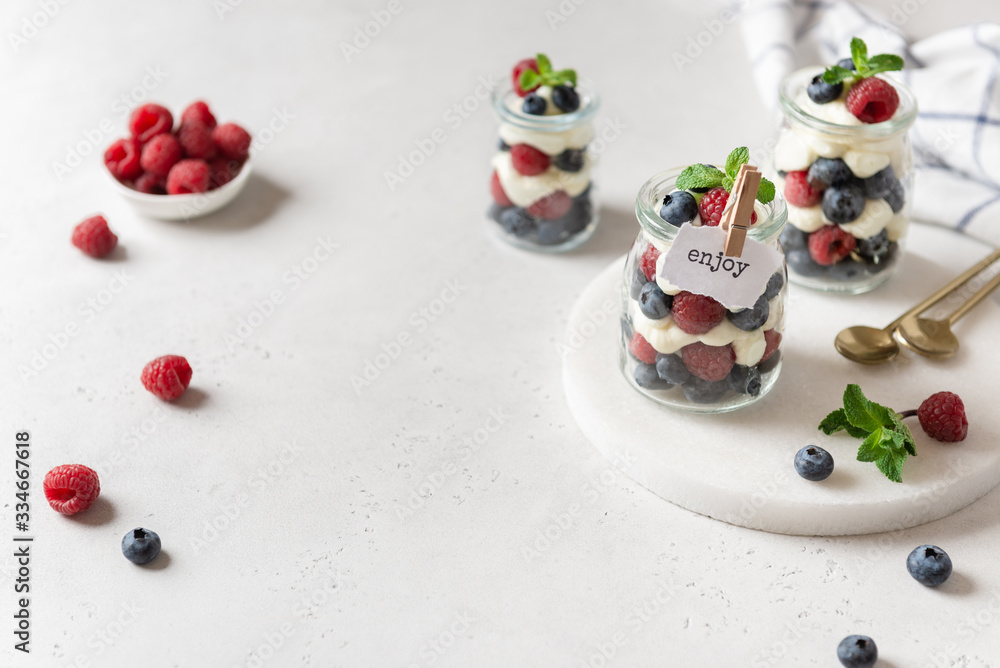 Raspberry dessert, parfait, trifle, mouse in a glass. Confectionery menu. Summer dessert. Copy space Raspberry dessert, parfait, trifle, mouse in a glass. Confectionery menu. Summer dessert. Copy space