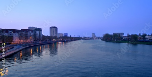 The Seine River and buildings in Alfrotville at sunset in Paris, France