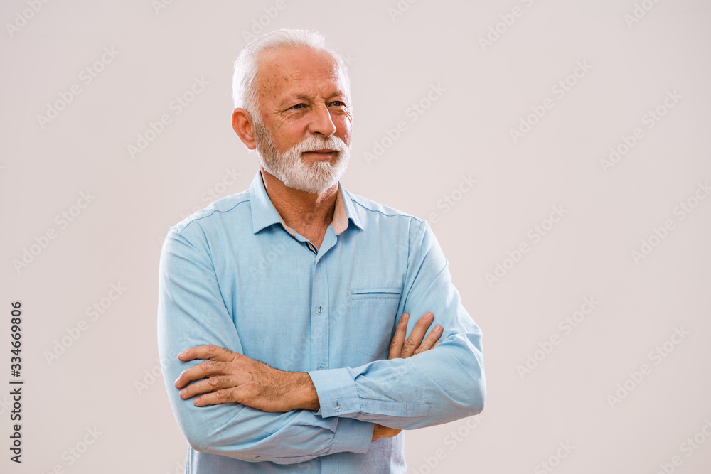 Portrait of senior man who is looking away. Portrait of senior man who is looking away.