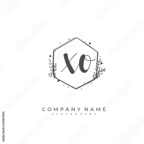 Handwritten initial letter X O XO for identity and logo. Vector logo template with handwriting and signature style.