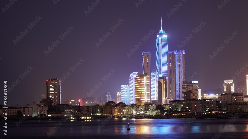 City night scenery. Reflection of Skyscrapers on water, China City night scenery. Reflection of Skyscrapers on water, China