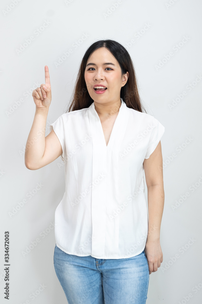Happy Asian Woman with finger point up isolate on white.. Happy Asian Woman with finger point up isolate on white..