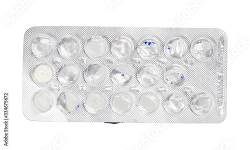 Empty blister pack of tablets isolated on a white background.