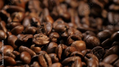 Stirring coffee. Plate with coffee. Coffee beans. Coffee. The production of coffee. Close-up.
