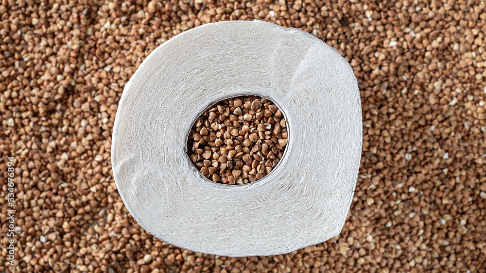 Essential goods: Buckwheat and Toilet Paper. Quarantine covid-19. Self-isolation at home during Coronavirus Epidemic. Conceptual background. Essential goods: Buckwheat and Toilet Paper. Quarantine covid-19. Self-isolation at home during Coronavirus Epidemic. Conceptual background.