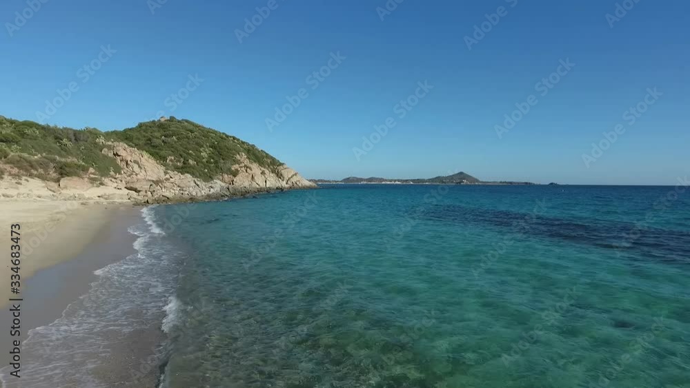 aerial view with drone of a beach with crystal clear water and cliff aerial view with drone of a beach with crystal clear water and cliff