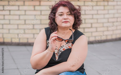 Photos Mature plus size woman, American or European appearance enjoying life