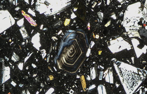 Fotografi Volcanic rock minerals under microscope