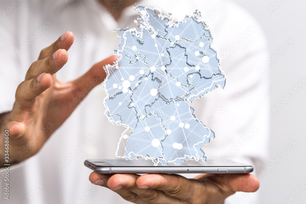 a virtual germany land map digital in hand 3d a virtual germany land map digital in hand 3d