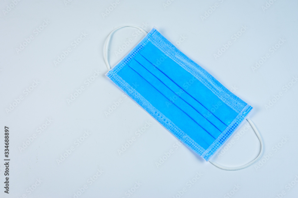 face mask to protect against corona virus on a white background face mask to protect against corona virus on a white background