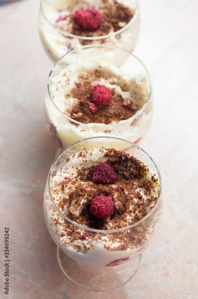 Raspberry dessert, cheesecake, trifle cake, mouse in glasses Raspberry dessert, cheesecake, trifle cake, mouse in glasses