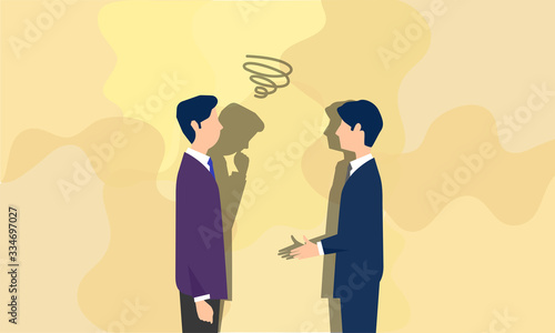 会話する二人のビジネスパーソン