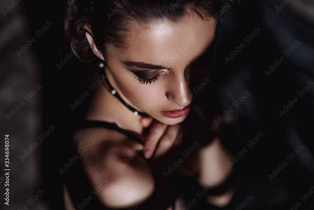 girl posing. portrait of a woman. close-up. look down. tender photo in lingerie. girl posing. portrait of a woman. close-up. look down. tender photo in lingerie.