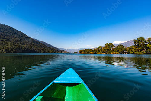 Canoe in the lake of Pokhara on Nepal © rayints