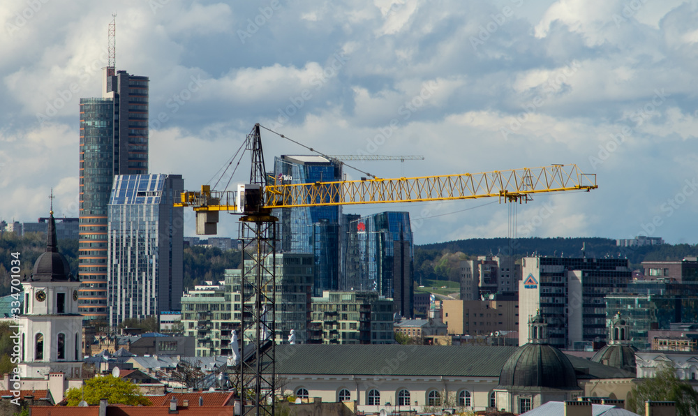 April 27, 2018 Vilnius, Lithuania, Construction crane on the background of skyscrapers in Vilnius.
