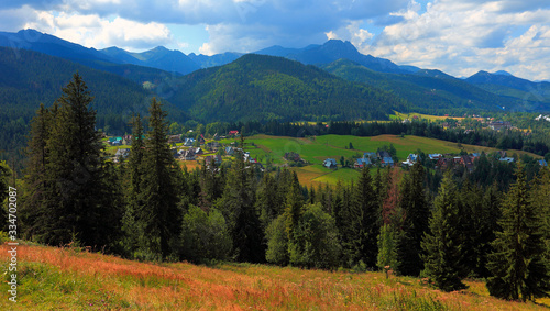 Panoramic view of Western Tatra Mountains with Czerwone Wierchy and Nosal peaks seen from Toporowa Cyrhla village near Zakopane in Poland