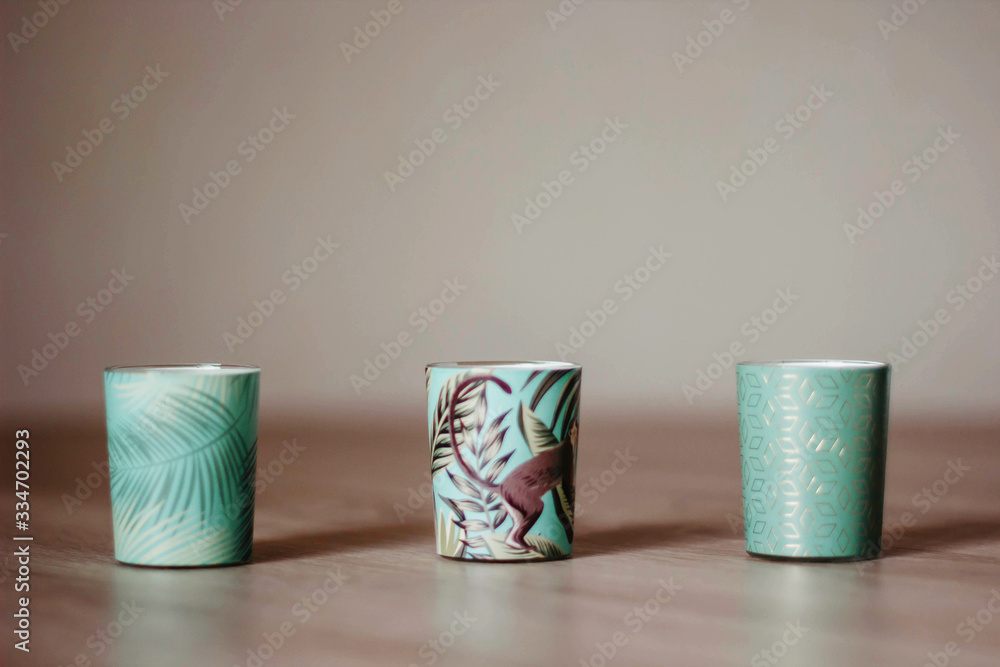 cups on wooden table cups on wooden table