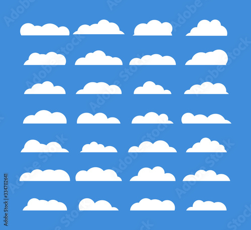 Cropped White Clouds. Set of Cropped White Clouds on blue background in the form of the sky. Flat. Vector illustration