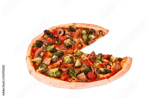 Pizza with veggie vegetables, without slice, top view, isolated on white